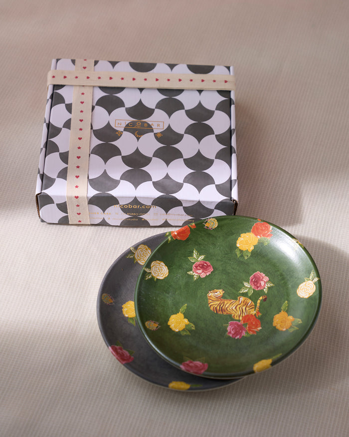 Stacked Tigress Quarter Plates in green and grey with tiger motifs.