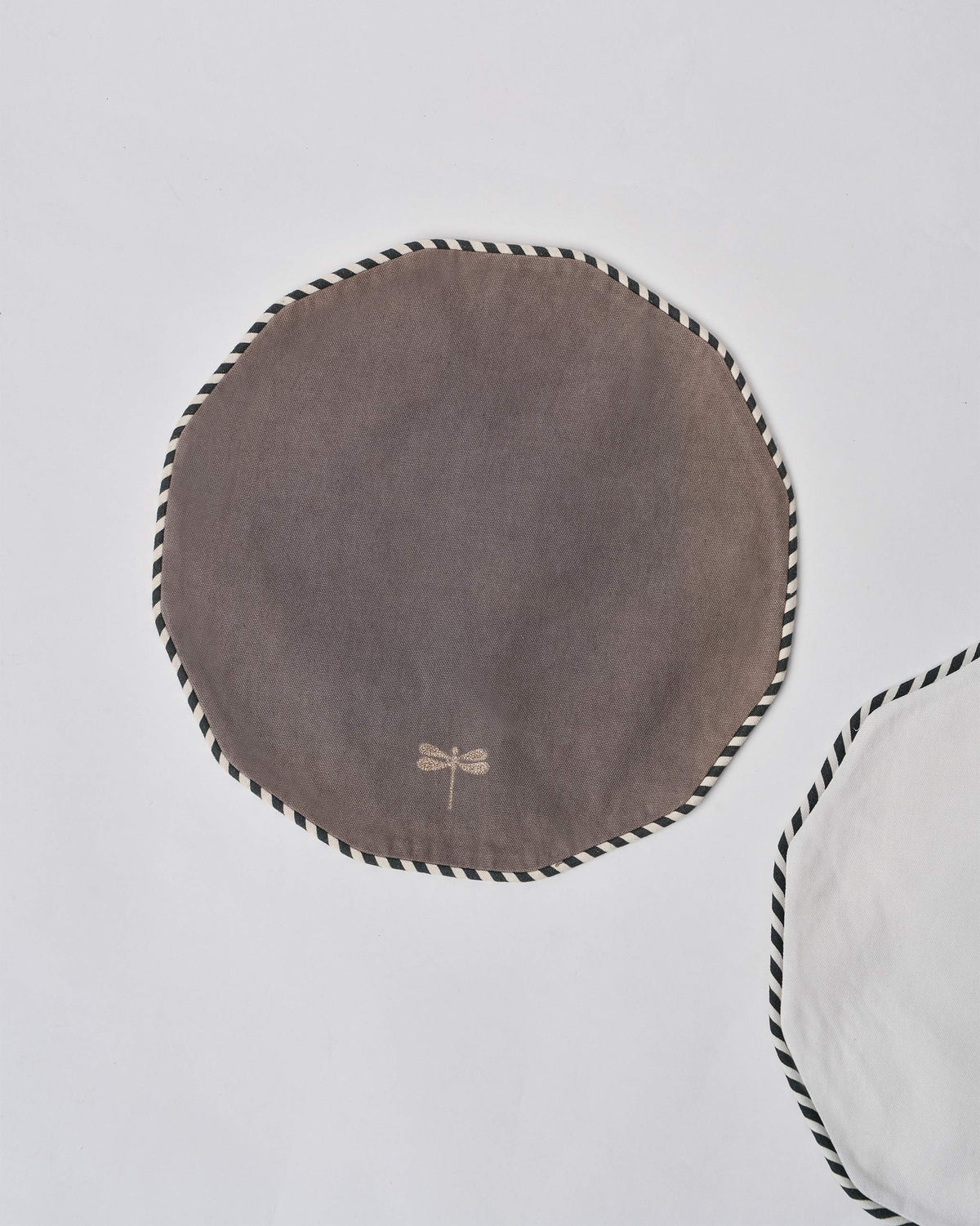 The grey placemat.