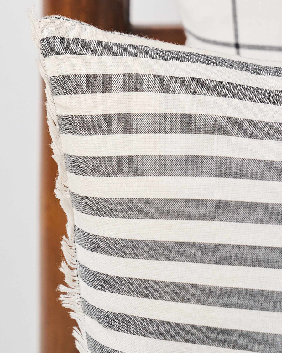 The stripes and fringe close up.