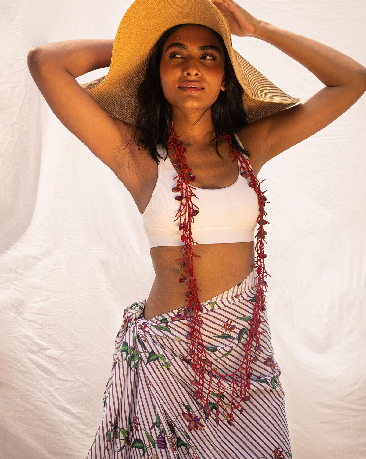 Person wearing the Riverine Sarong wrapped at the hips.