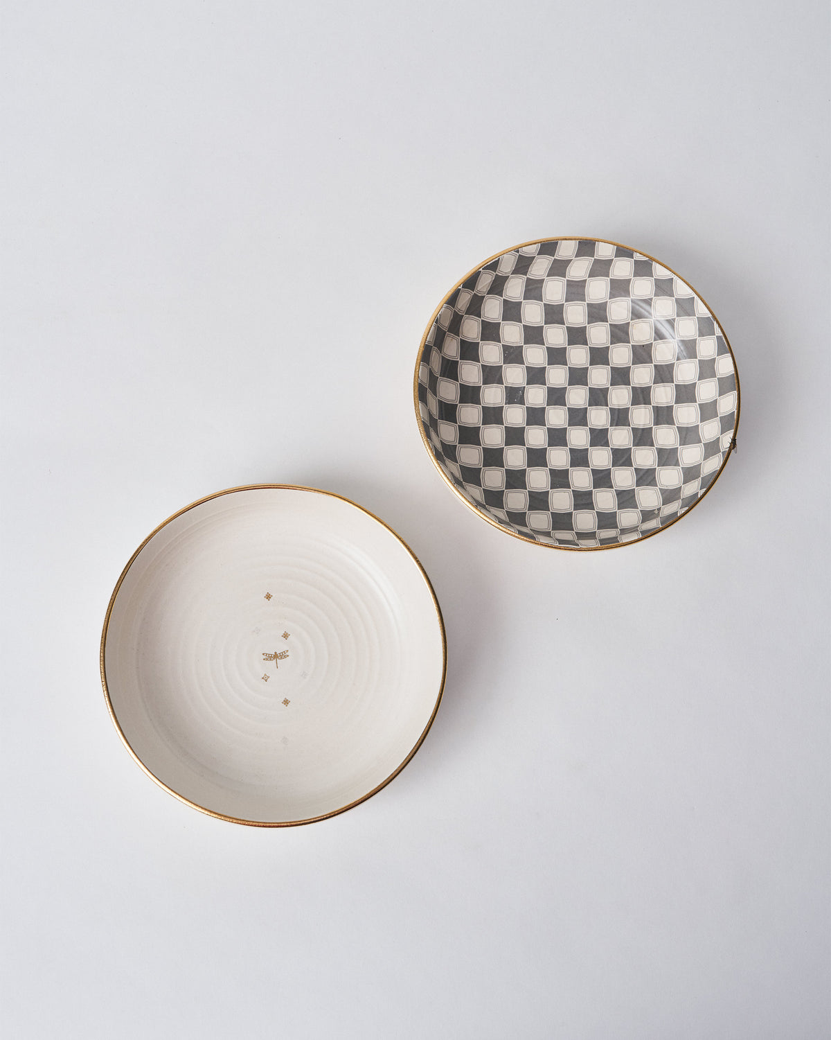 Fez Shallow Bowls showing a gold dragonfly motif and a checkered interior.