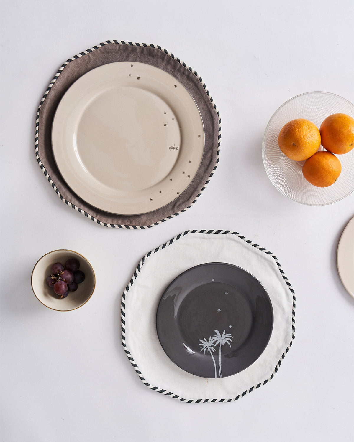 The placemats under plates.
