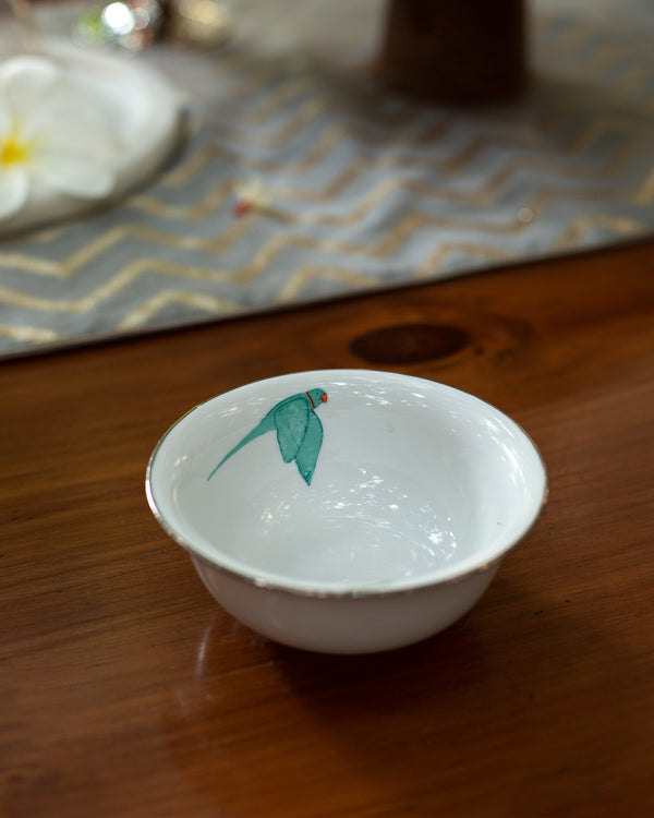The katori with a green bird inside