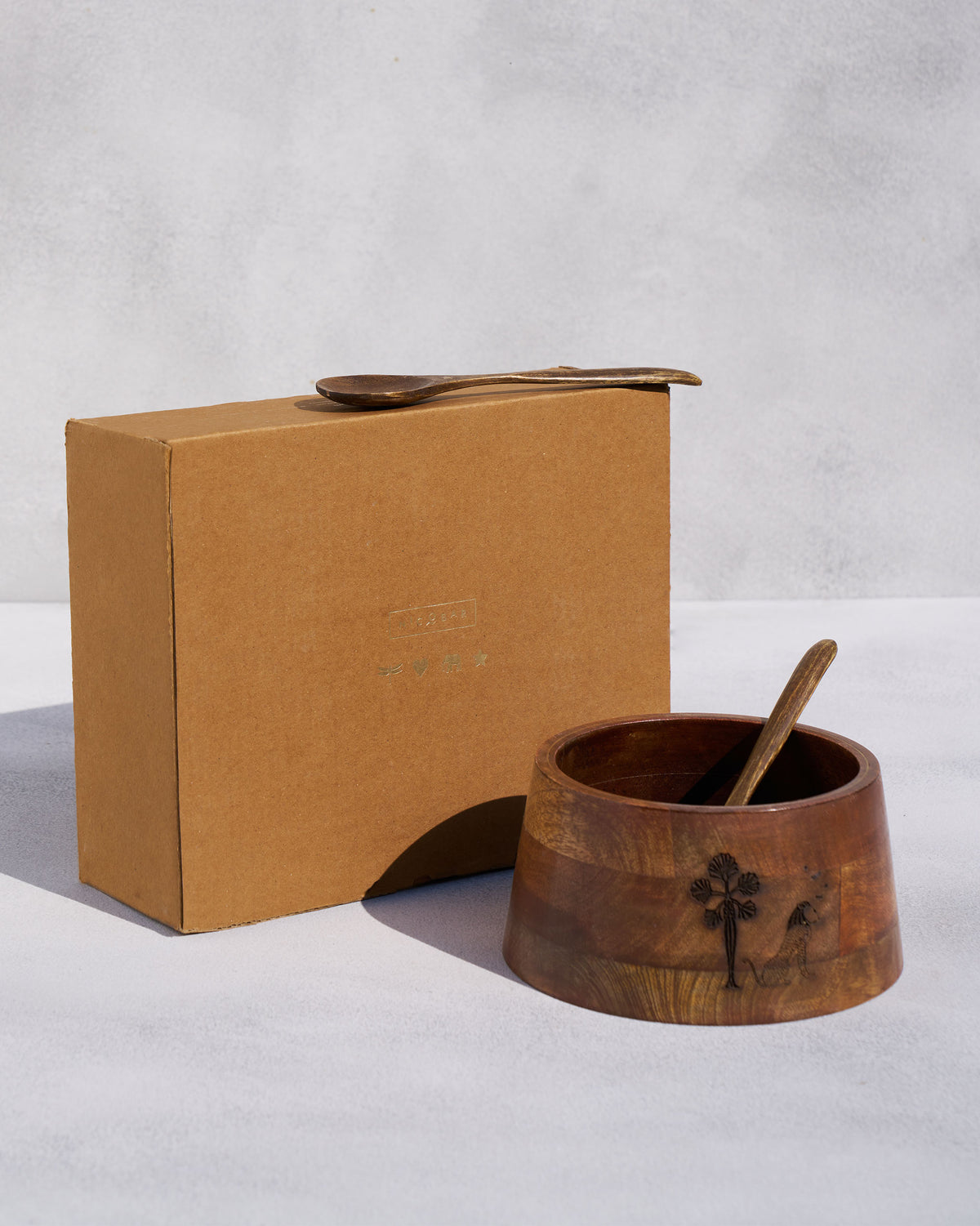 Bara wooden salad bowl and spoons with a Nicobar cardboard gift box.