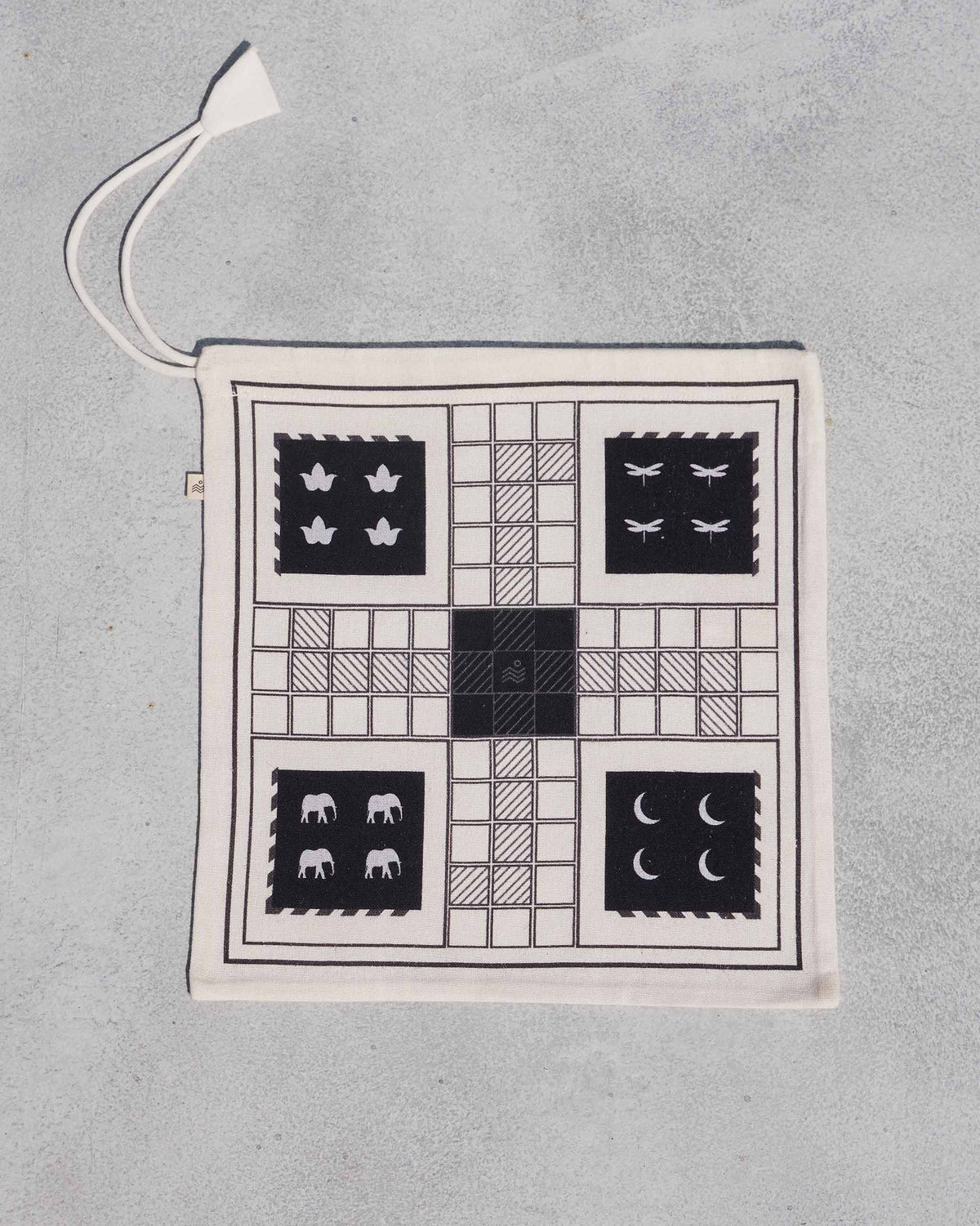 Nico Ludo cloth board as a drawstring pouch with the full game print.